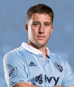 a headshot photo of matt besler